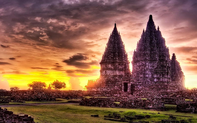 Panoramic view of famous temples in India, showcasing ancient architecture, vibrant temple towers (gopurams), and devotees at a historic pilgrimage site